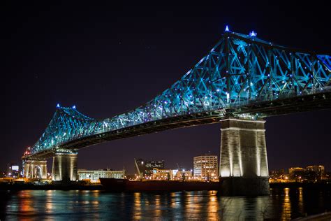 Jun 18, 2023 · The Jacques Cartier Bridge is a steel truss bridge, connecting Montreal, Quebec with the South Shore suburb of Longueuil. The project was first announced by the provincial government in 1931, and the bridge was officially completed in 1930. 